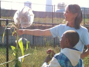 Kyla Cox teaching environmental education to youth in Des Moines