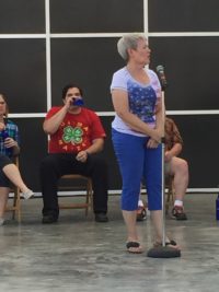 Cyndy Erickson as a master storyteller at the Des Moines Register's story telling stage at the Iowa State Fair