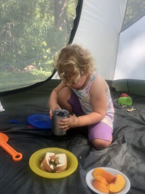 Eating peaches in the tent